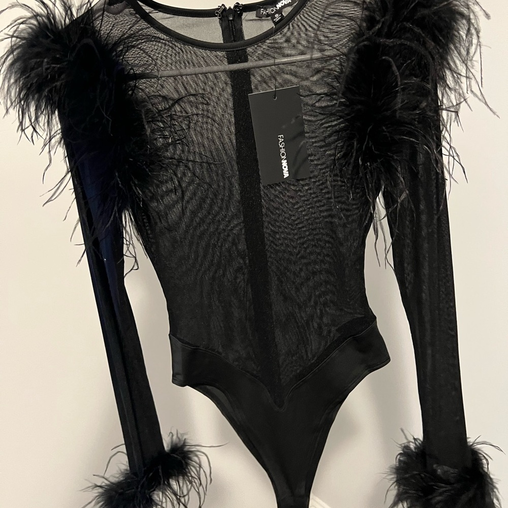 Feather onesie new!